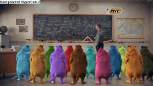 a group of colorful bears are standing in front of a blackboard with a bic logo on it