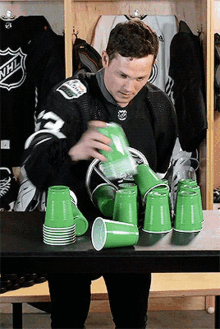 Jeff Skinner Stacking Cups GIF