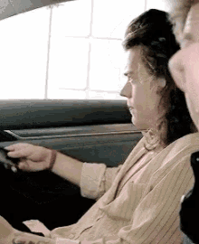 Harry Styles Car GIF - Harry Styles Car Texting GIFs