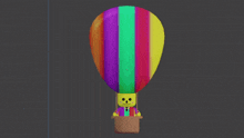 a colorful hot air balloon with a person sitting in it