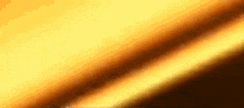 a blurred image of a yellow and brown background