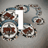 a bunch of bwr alliance poker chips with the number 1