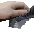 a close up of a person 's hand holding a gun