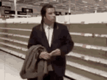 Empty John Travolta GIF - Empty John Travolta Hoarding GIFs