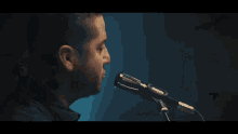 a blurry picture of a person playing an acoustic guitar