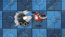 a red box with a star on it is on a blue tile floor