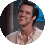 a man in a white suit is smiling in a circle