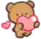 a cartoon teddy bear is holding a pink heart in its mouth .