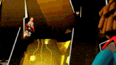 a cartoon character is standing in a dark room with a yellow light coming out of it