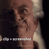 a close up of a man 's face with the words clip + screenshot above him