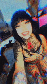 a girl with a tattoo on her arm is smiling
