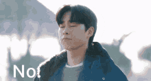 a man with his eyes closed and the word no written on the bottom