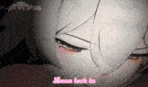 a close up of a girl 's face with the words luna lock in in pink