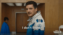 a man in a fantastic 4 outfit says i don 't know