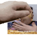 a hand is holding a piece of food over a man 's face and says no editing required .