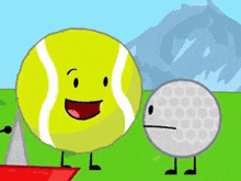 a tennis ball and a golf ball are standing next to each other on a field