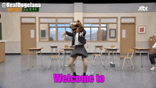 a woman in a dog costume is dancing in a classroom with the words welcome to written in pink