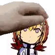 a hand is touching a cartoon girl 's face .