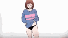 a girl wearing a blue and pink striped sweater is standing in front of a white background .