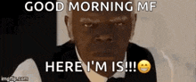 a man in a tuxedo and bow tie is saying `` good morning mf here i 'm is '' .