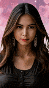 a close up of a woman 's face with a pink background
