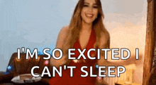 a woman in a red dress is saying i 'm so excited i can t sleep