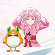a girl in a pink dress is standing next to an orange frog with green eyes