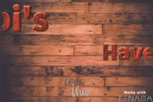 a wooden background with the words ' i 's love this ' written on it