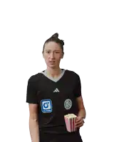a woman in a black adidas shirt is holding a popcorn bucket
