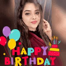 a woman is surrounded by balloons and candles and the words happy birthday
