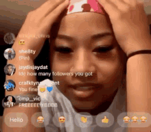 a girl with a crown on her head talks to a group of followers