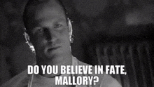 a man says do you believe in fate mallory in a black and white photo