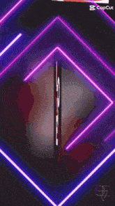 a woman with red hair is surrounded by purple lights and the letter e is visible