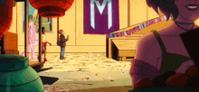 a woman stands in front of a sign that says m on it