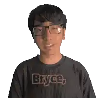 a man wearing glasses and a shirt that says bryce on it