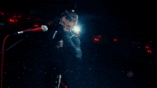 a blurry image of a person 's face in the dark