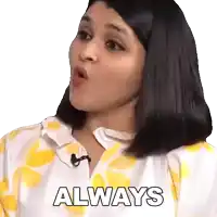 a woman wearing a yellow and white shirt with the word always written on it