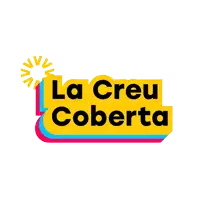 a yellow sign that says la creu coberta with a sun in the background