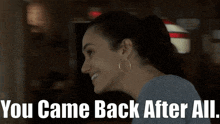 a woman is smiling with the words you came back after all