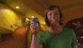 a scooby doo dog is being fed a can of dog food