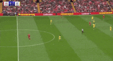 a soccer game is being played on a field with ads for loadbrakes on the sidelines