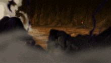 a person laying on the ground in a cave