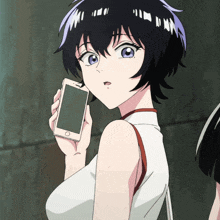 a girl is holding a cell phone in her hand