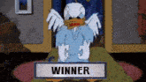a cartoon of a duck with wings and the word winner in front of him