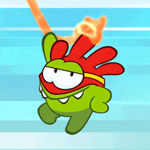 a green cartoon character with red hair and a yellow band around his head