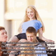 a man carrying a woman on his shoulders with a quote from regina george