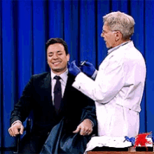 a man in a suit is being examined by a doctor in a white coat