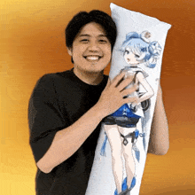 a man is holding a pillow that has a girl on it