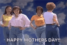 a group of women are dancing together in front of a blue sky and clouds .