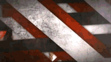 a red white and black striped background with a triangle in the corner